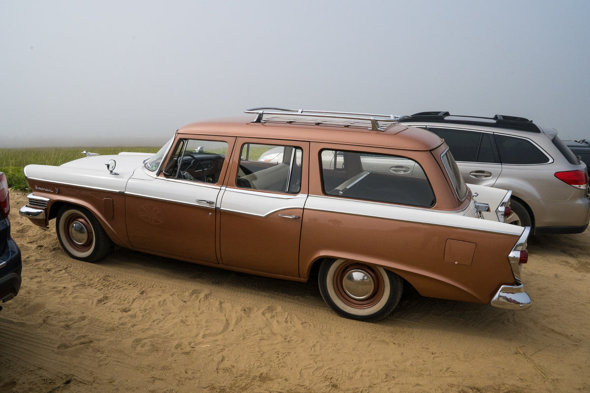Copper paint, white fins and sea fog turn a beachside wagon into a memory of summers past.